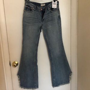Free People NWT Vintage frayed bottom jeans.